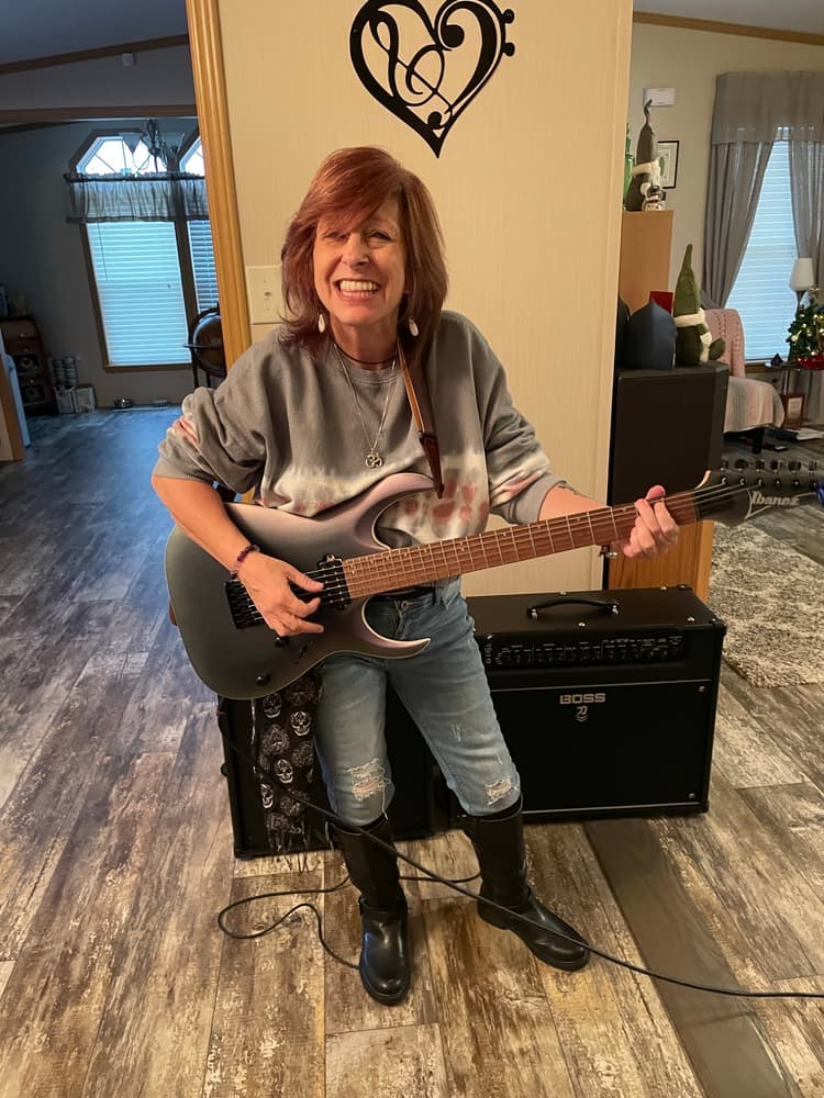 Nancy lead vocals, front person, percussionist and rhythm guitarist